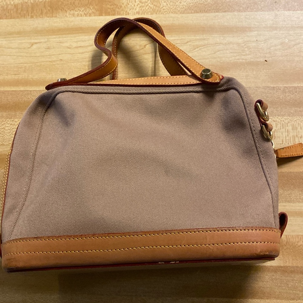 Beige Dooney and bourke
